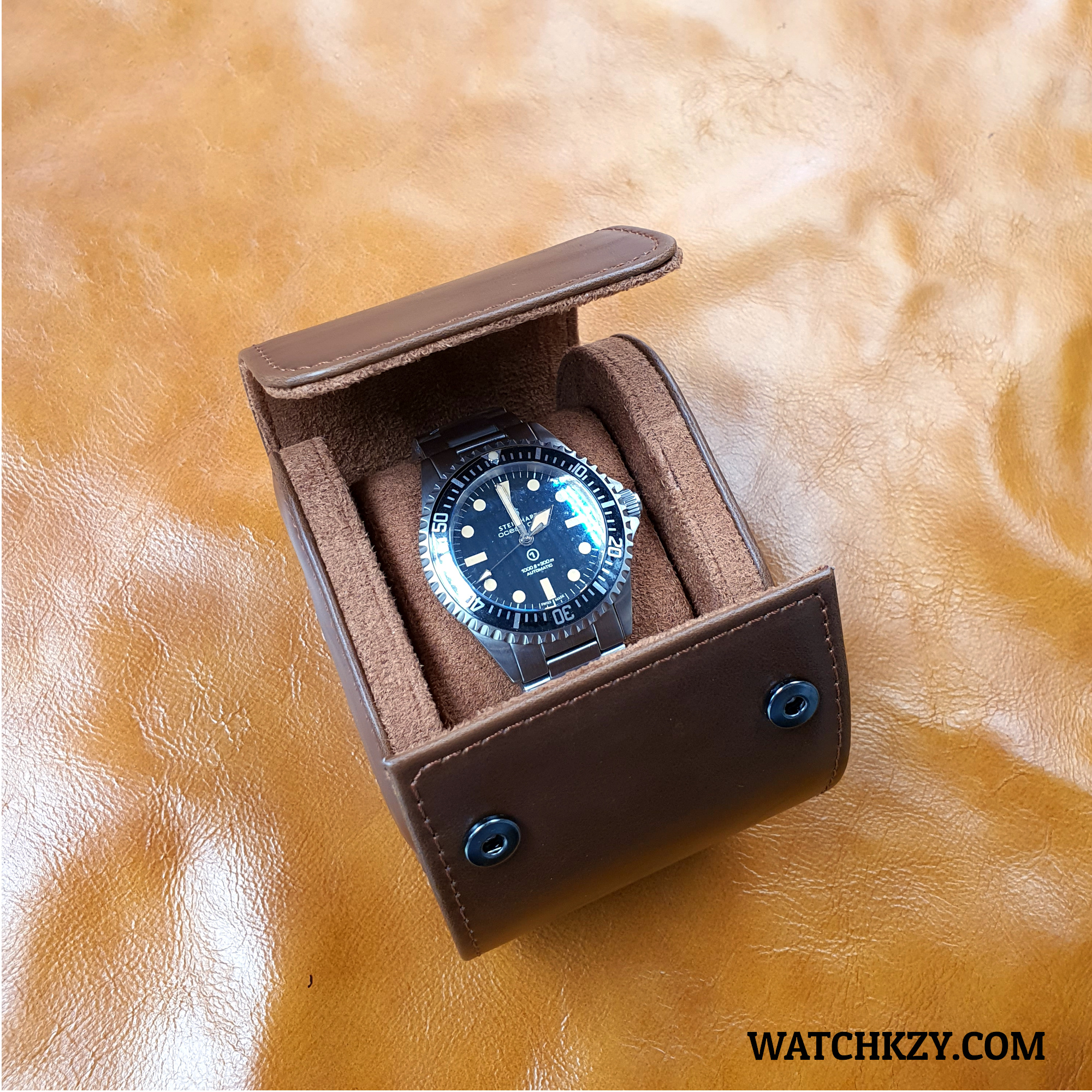 leather watch case 1 with watch 2